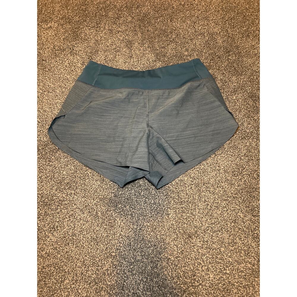 Athleta Run With It Textured 3.5" Womens xs Teal Zip Pocket Lined Drawstring